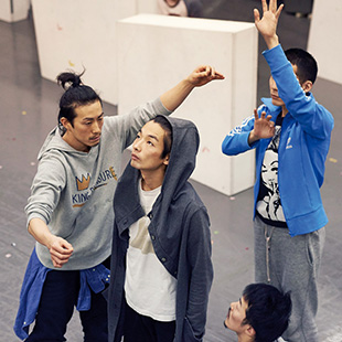 The cast of PLUTO rehearsing