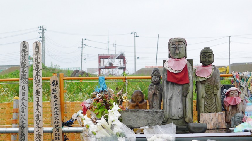 The shell of the Bōsai Taisaku Chōsha (防災対策庁舎 ) and a shrine honoring those who perished there. 