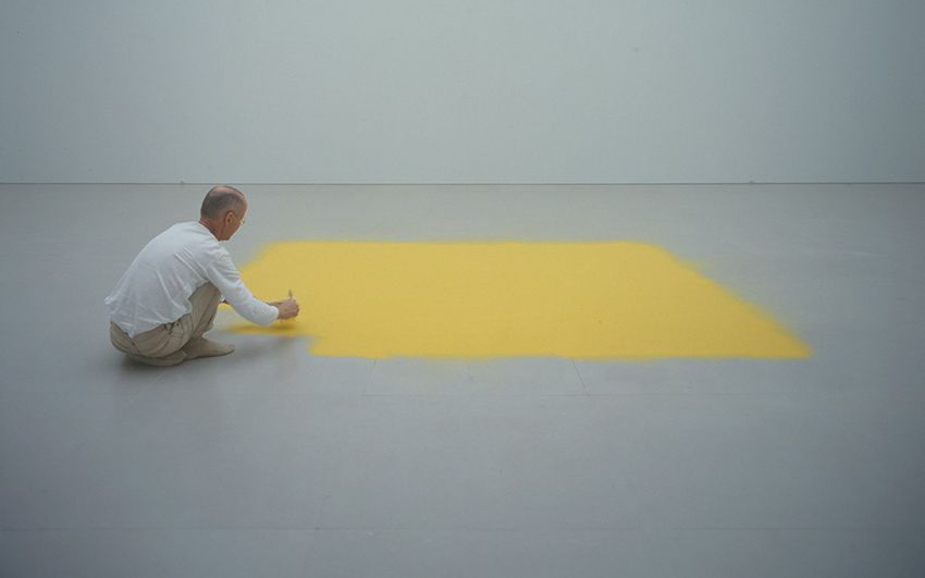 Wolfgang Laib installing Pollen from Hazelnut at Toyota Municipal Museum of Art, Aichi, 2003