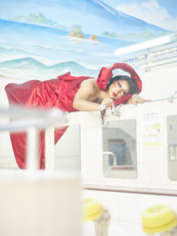 Drag queen Labianna in Daikokuyu sento in Tokyo, posing dramatically 