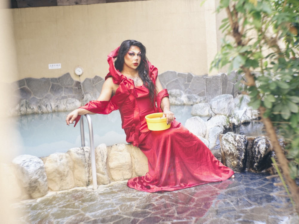 Drag queen Labianna in Daikokuyu sento in Tokyo, posing dramatically 